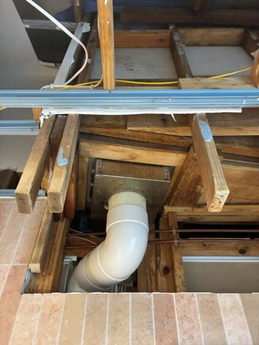 Mould Mates remediation in progress, with containment established and a ceiling opened up to reach mould affected material in the cavity